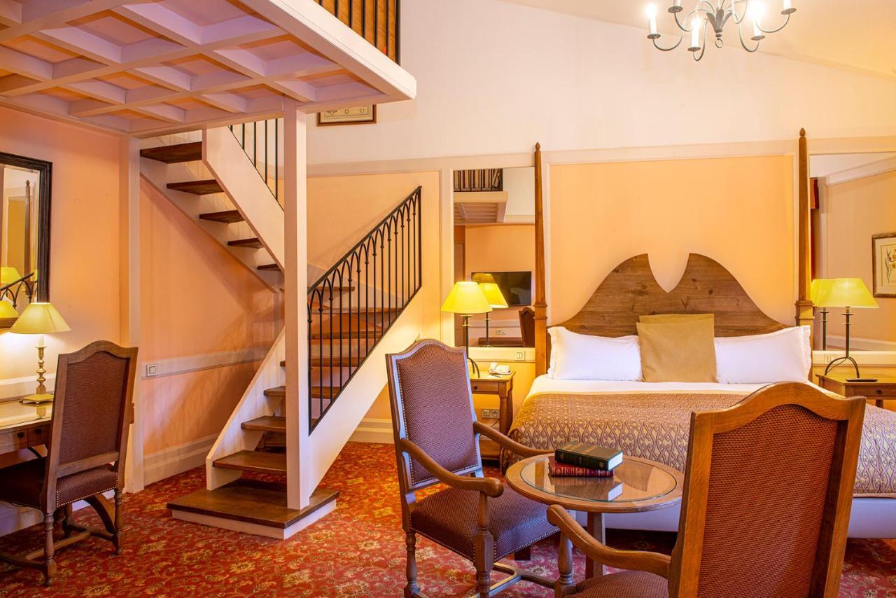 Hotel de la Cité&Spa MGallery Carcassonne Esterno foto A suite at the hotel